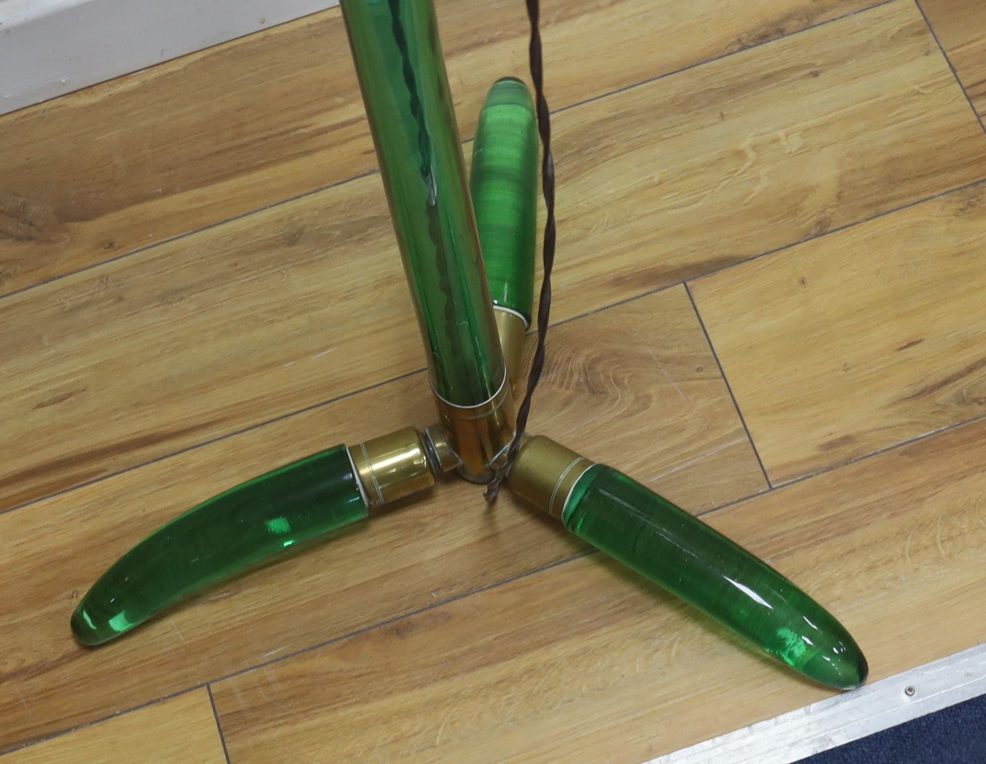 An unusual sectional green glass and brass standard lamp, height 154cm